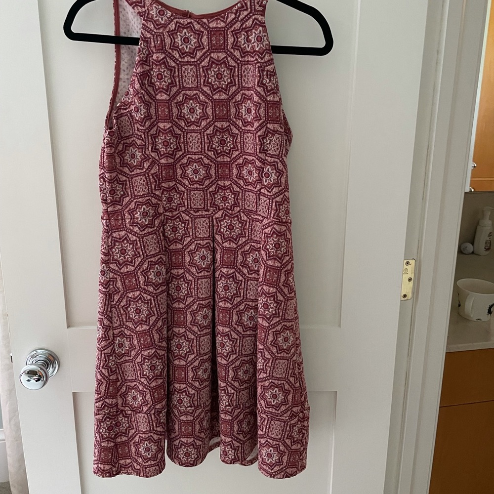 Pink patterned mini dress with back cut out